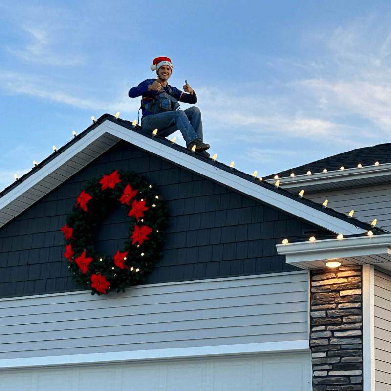 Professional Christmas light installation on roofline